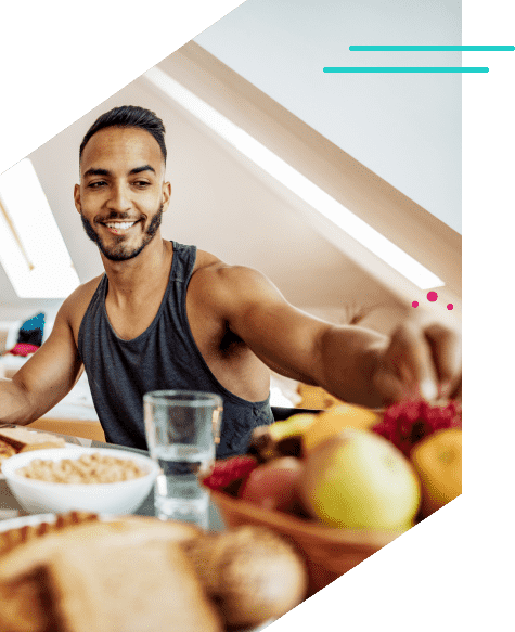 man eating fruit