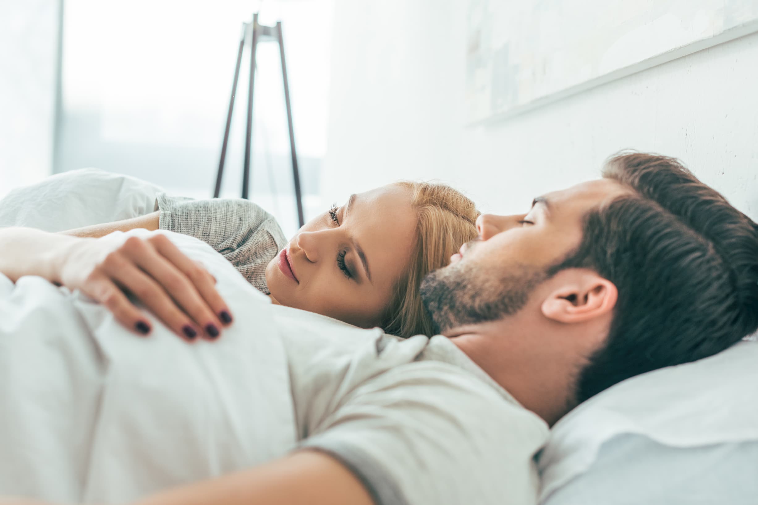 couple sleeping in bed