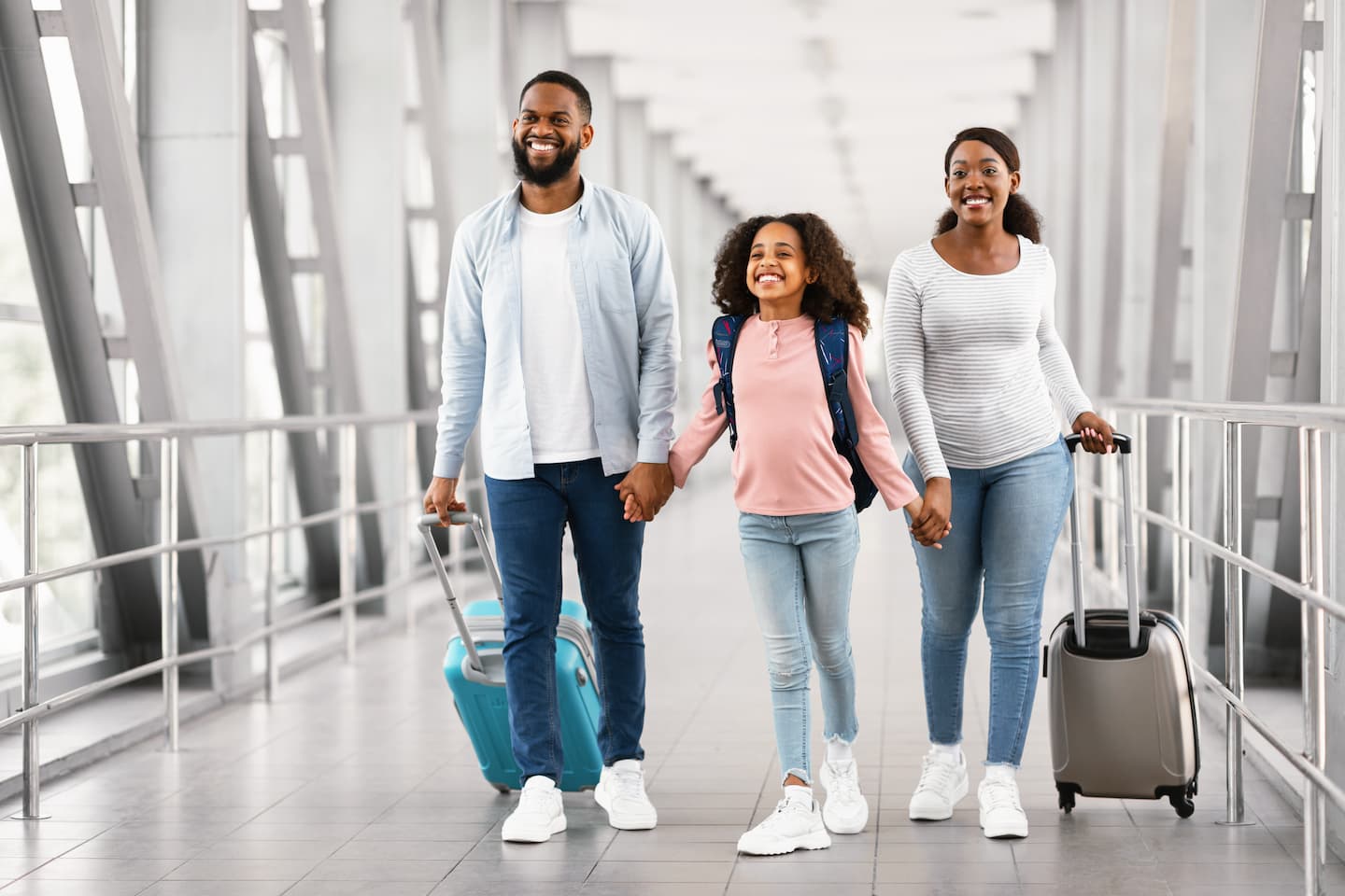 happy family at an airport